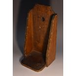 Treen - a primitive 19th century scumbled wall hanging candle bracket, 26cm high, c.1860