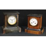 A 19th century French marble mantel clock, 24cm high, c.1880; another, walnut and ebonised (2)