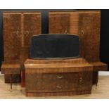 A retro imitation rosewood and walnut four-piece bedroom suite, by Beautility, comprising wardrobes,