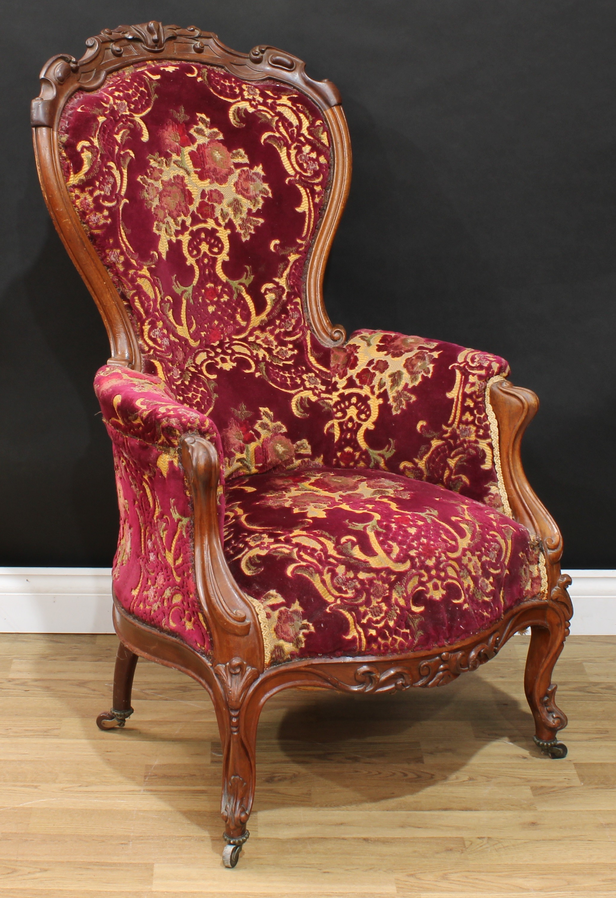 A Victorian spoon back drawing room chair, 111cm high, 65cm wide, the seat 42cm wide and 38cm deep