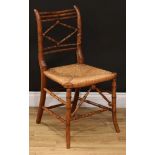 A Regency design Chinese Chippendale inspired elm faux-bamboo side chair, rush seat, 82.5cm high,