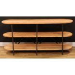An industrial design softwood and metal open bookcase or three-tier side table, discorectangular