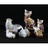 A Royal Crown Derby paperweight group, Cat Family, silver stoppers; another paperweight group, Ram