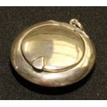 A silver circular pill box, 4.5cm diameter, hallmarks to interior.