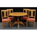 A contemporary solid oak circular pedestal dining table, 75cm high, 107cm diameter; a set of four