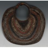 Tribal Art - a Papua New Guinea neck ornament, worked in fibres and coloured with concentric bands