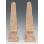 A pair of marble library obelisks, stepped square bases, 31cm high