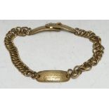 A 19th century brass dog collar, the central panel engraved Wm. Solomon, Sun Inn, Callington,