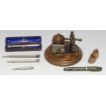 A 19th century silver coloured metal combination propelling pencil and pen, chased and engraved with