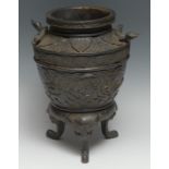 A Chinese bronze ovoid vase or censer, cast with phoenix, blossoming prunus and lotus lappets,