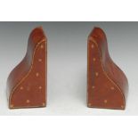 A pair of Edwardian morocco shaped bookends, retailed by Walter Jones, Sloane Street, London,