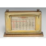 An Art Deco period desk calendar, spreading rectangular base, 21cm wide, c.1940