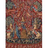 A Medieval style wool work tapestry, embroidered in colour threads with the The Lady and The