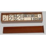 A set of 19th century prisoner of war bone dominoes, the associated mahogany box 19cm long