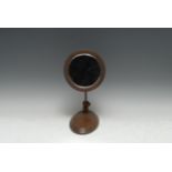 An early 20th century mahogany campaign type travelling shaving mirror, adjustable for table-top and