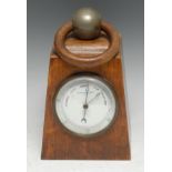 A Victorian oak novelty ameroid barometer, as a weight, 8.5cm enamel register inscribed Harrison &