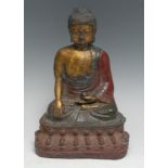 A Chinese cast iron Buddha, seated in meditation, lotus base, 26cm high