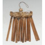 Tribal Art - a Batak bamboo and bone calendar or Porhalaan, 18cm long, Sumatra