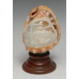 An Italian cameo conch shell, carved in the Grand Tour taste with a named view of Vesuvius [