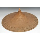 A large pair of Chinese kasa or sugegasa conical hats, 62cm diam, probably from Hainan, mid-20th