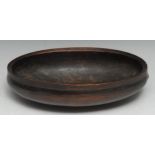 Tribal Art - an African food bowl, quite plain, carved geometric motif to one end, 26.5cm wide,