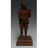 A North European oak carving, of a musician, square base, 29.5cm high