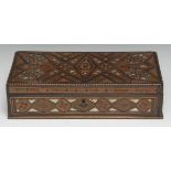 A Middle Eastern marquetry rectangular box, inlaid throughout in the Moorish taste with specimen