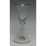 An early George III double opaque and cotton twist wineglass, trumpet-shaped bowl, the stem with
