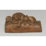 A Black Forest cabinet carving, The Lion of Lucerne, after Bertel Thorvaldsen, 8.5cm wide, early