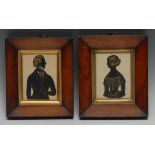 English School (19th century), a pair of portrait silhouettes, of a lady and gentleman, half-length,