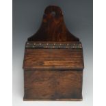 A 19th century elm and oak candle box, sloping cover with leather hinge, enclosing twin