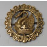 A 19th century Scottish brass clan badge, Stirling of Cudder, Stirlingshire, with crest and motto