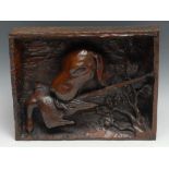 A 19th century folk art panel, deeply carved as a primitive sporting diorama, with a naive depiction