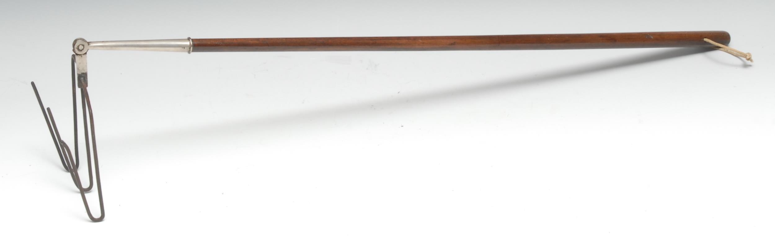 A George III toasting fork, articulated three-prong head, fruitwood handle, 86cm long