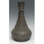 A Middle Eastern/Indian tinned copper hookah base, chased in the Islamic taste with dense