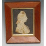 A 19th century wax portrait, of a gentleman in Ancien Regime attire, 9.5cm x 6cm, framed, 16cm x