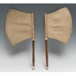 A pair of Oriental hand screens or banners, rattan axehead flags, turned hardwood handles, bone