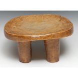 Tribal Art - a Senufo stool, slightly dished top, four legs, 33cm wide, West Africa