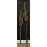 Tribal Art - a Polynesian paddle, the leaf shaped blade pierced and chip-carved, 142cm long;