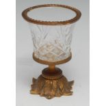 A 19th century ormolu mounted clear glass mantel vase, in the manner of Osler, the base cast with