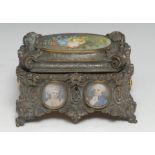 A 19th century French Rococo Revival silvered table casket, cast throughout with scrolls, flowers,