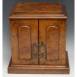 A Victorian burr walnut table cabinet, slightly oversailing pagoda top above a pair of rectangular