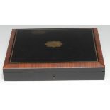 A 19th century kingwood and ebonised rectangular playing card box, hinged cover inlaid with a vacant