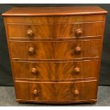 A Victorian mahogany chest of drawers, bow-front top above two short and three long graduated