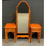 A Bradley reproduction mahogany cheval looking glass, 148cm high, 51cm wide; a pair of of