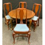 A Queen Anne mahogany extending, 103cm dining table, oval top, cabriole legs, 66cm high; a set of