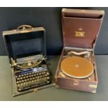 A His Masters Voice portable wind-up model 101 Gramophone, serial No 29631, brown case; a