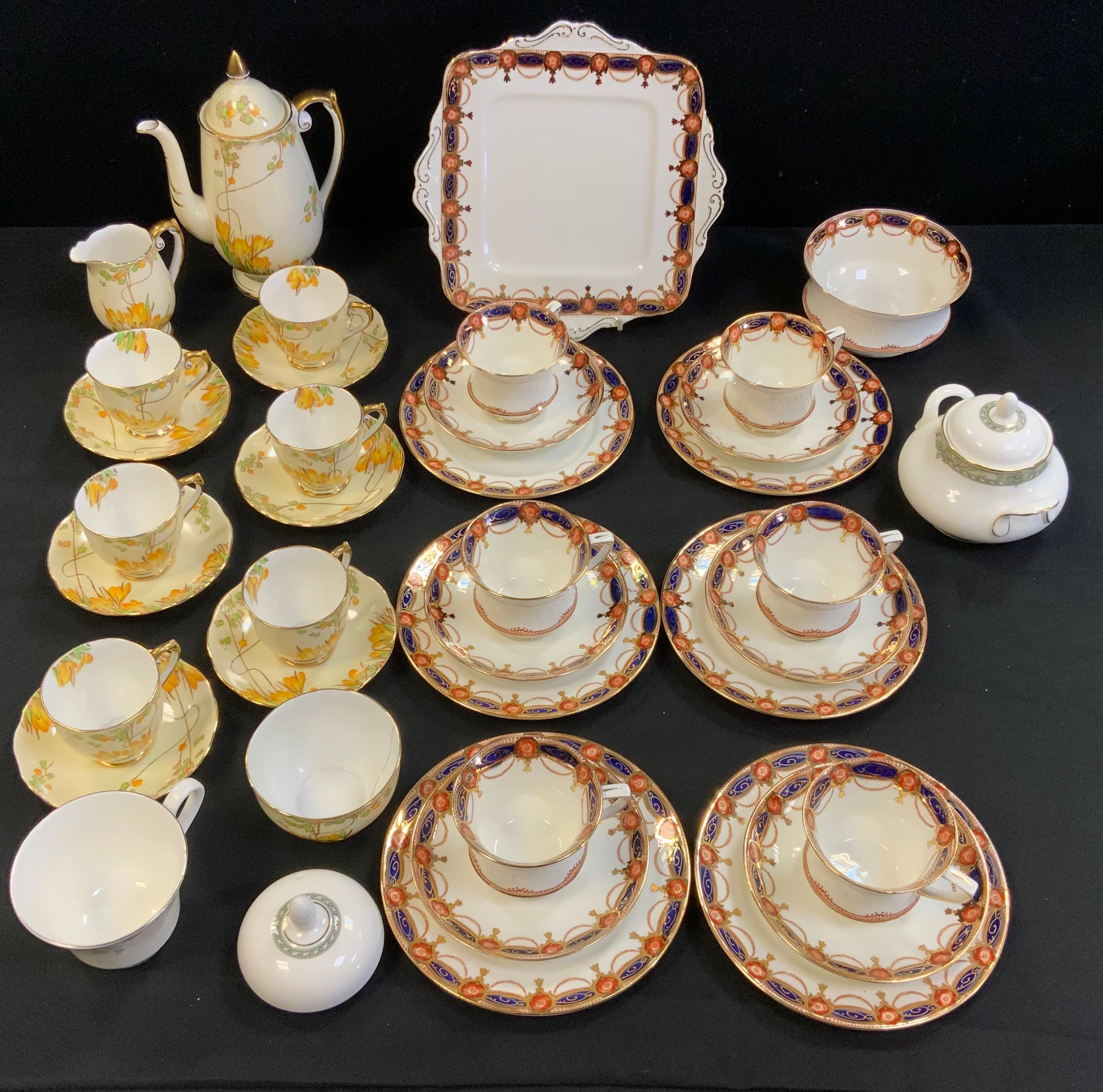 A Paragon six setting tea service; a Roslyn six setting crocus coffee service, etc