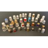 Thimbles - a Charles Horner silver thimble, Chester 1895; others Birmingham 1930; others ceramic,