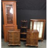 A 20th century display cabinet, half gallery above a glazed door enclosing glass shelves, cabriole